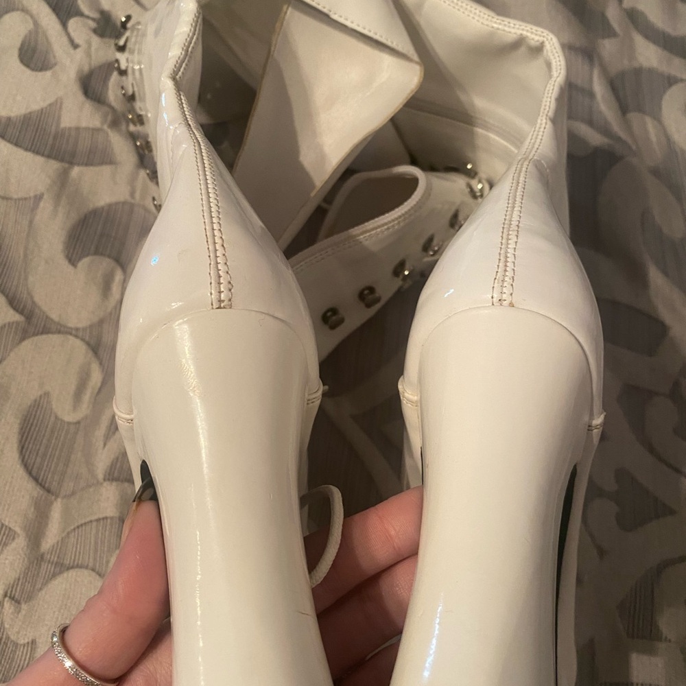 Knew high white boots